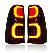 Load image into Gallery viewer, Black Tail-Lights | Toyota Hilux From 2003 On
